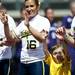 Michigan fan Natalie Harper cheers on players as they are introduced to the game against Northwestern on Sunday, May 5. Daniel Brenner I AnnArbor.com